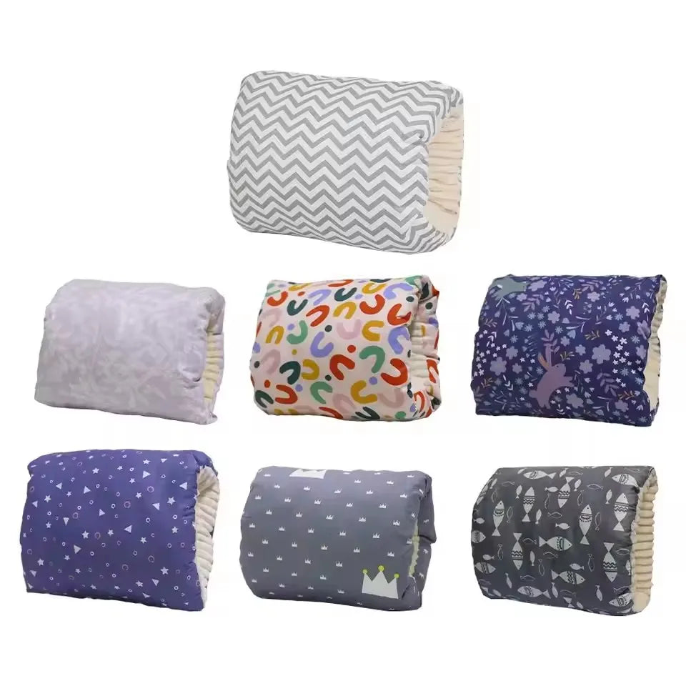 Assorted colorful baby blankets with playful patterns, perfect for Kid Zone nursery essentials.