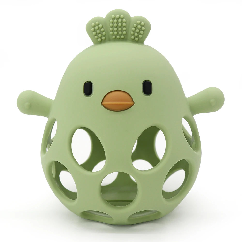 Green silicone baby rattle shaped like a chicken, ideal for safe and fun play at Kid Zone
